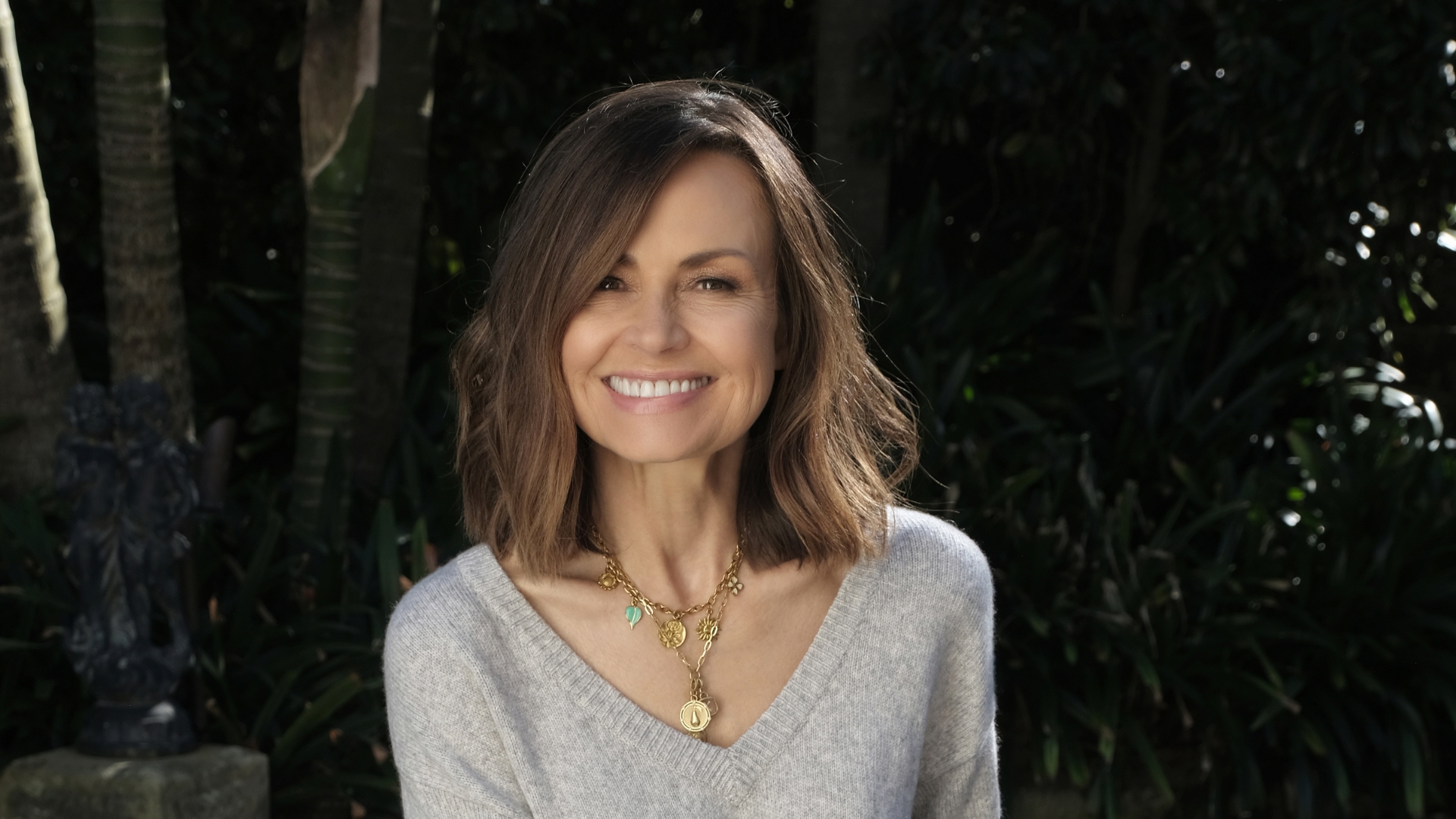 A close up image of media personality Lisa Wilkinson as she smiles in the afternoon sun.