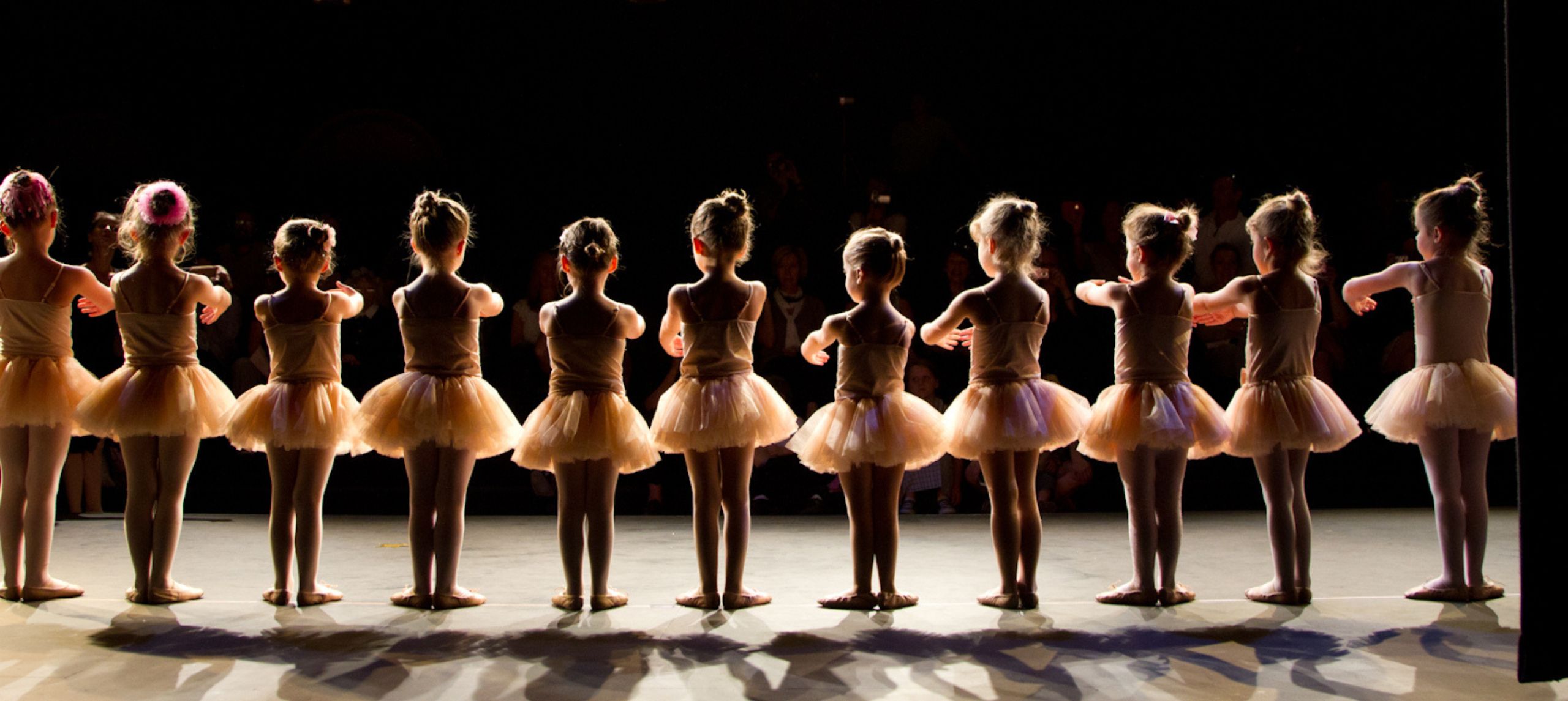 small ballerinas facing the audiance