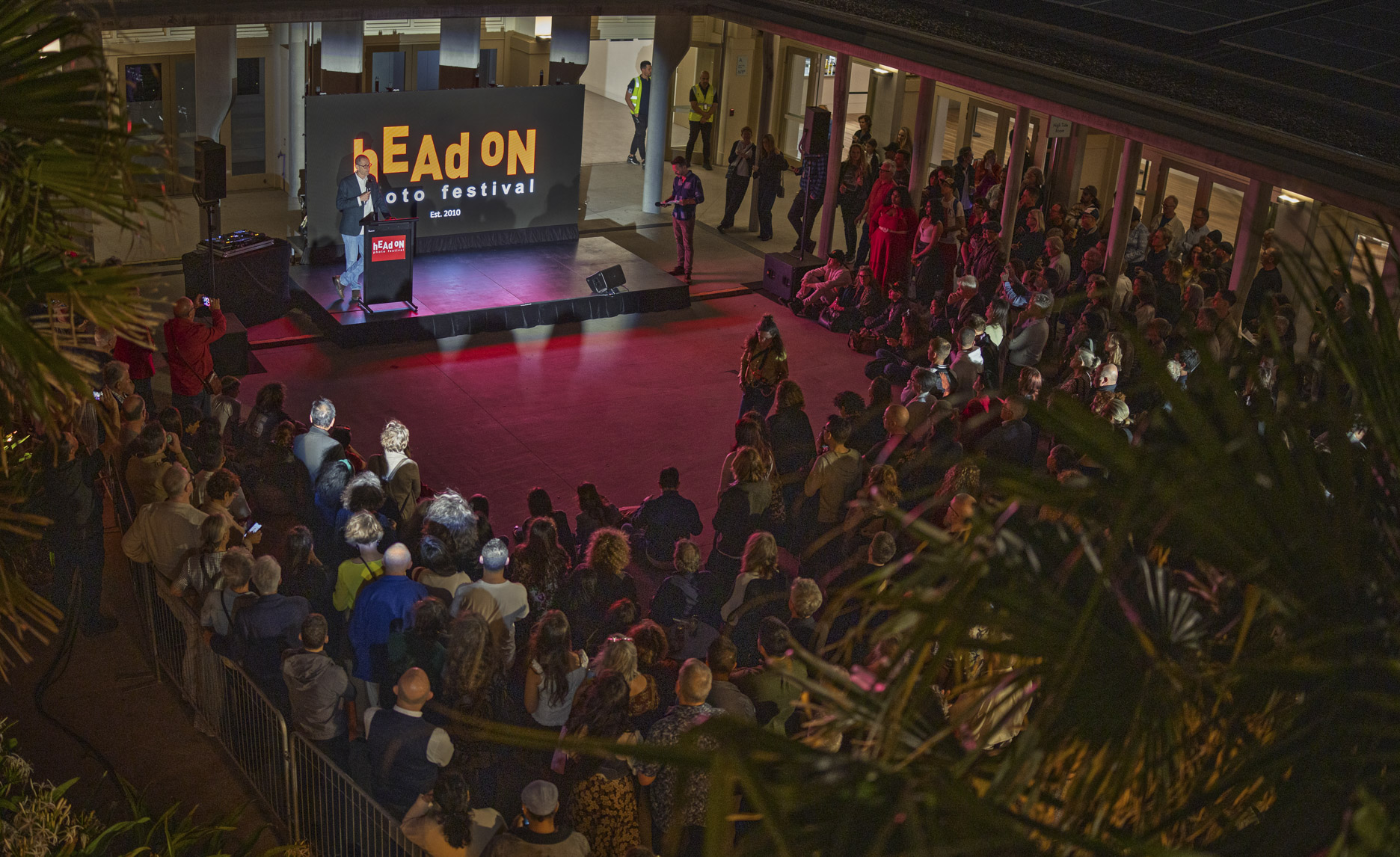 The festival director addresses the crowd at Head On Photo Festival at Bondi Pavilion.
