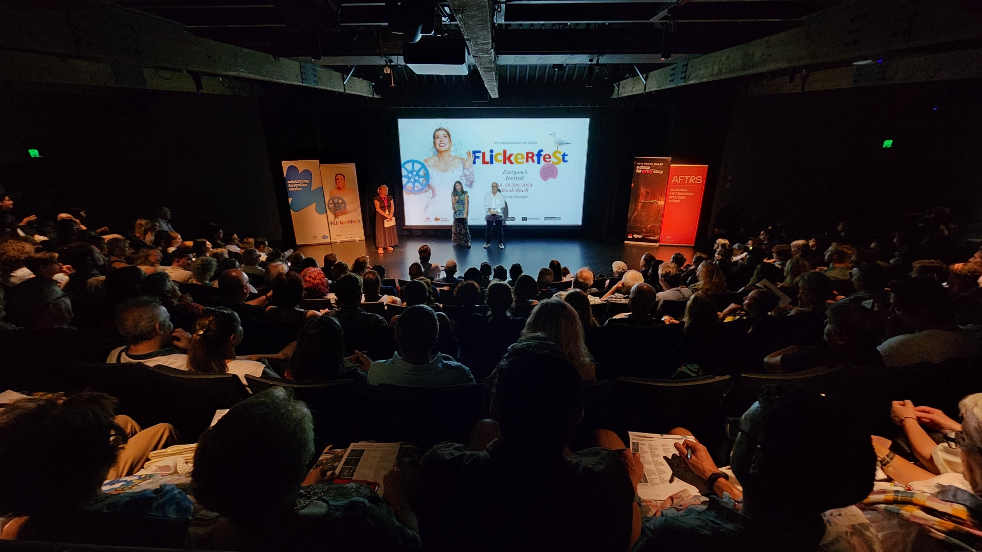 Flickerfest indoor cinema audience enjoying the best of short films from around the world, in the Bondi Pavilion Theatre 