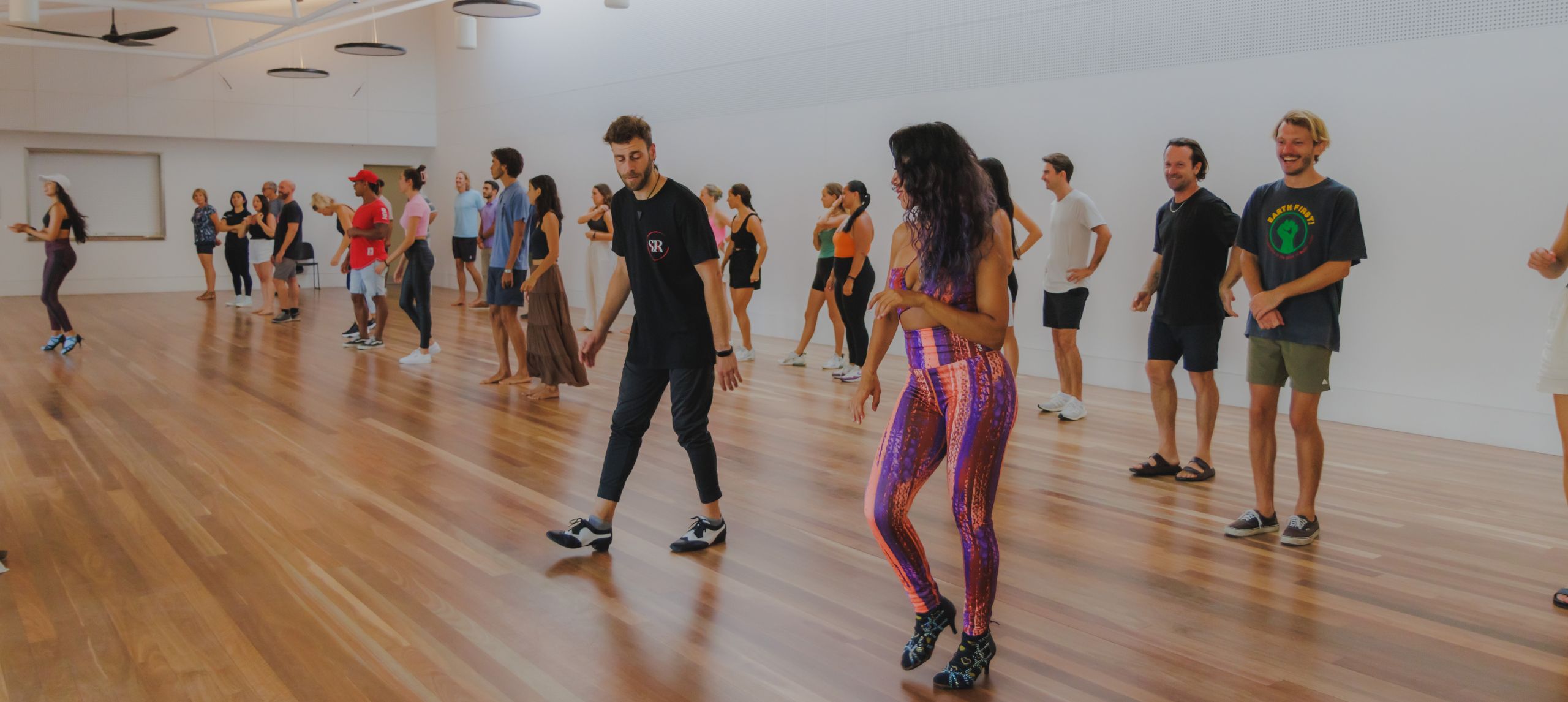 latin dance class in the pav's high tide room