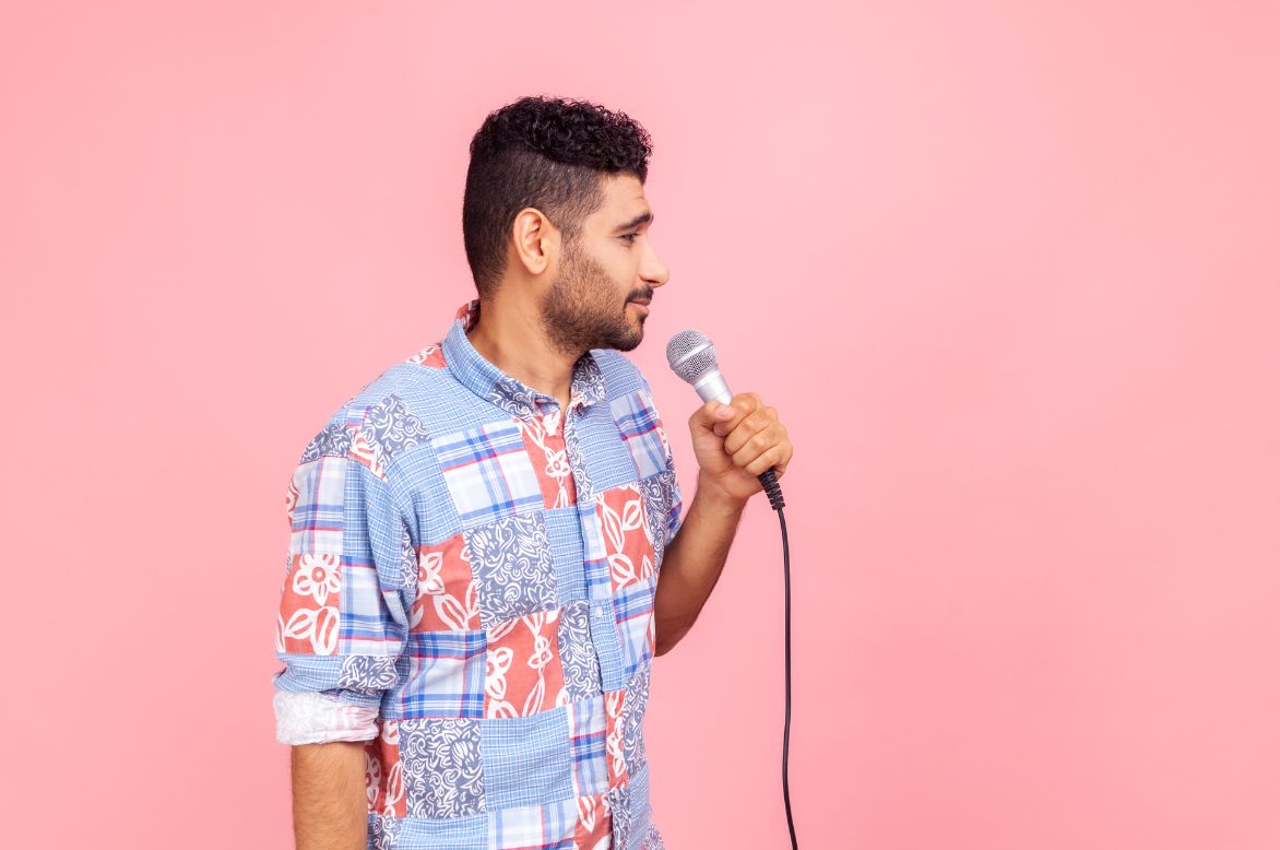 Lady with big hair and pink background