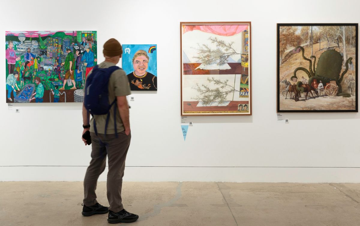 Image of man looking at the Waverley Art Prize exhibition.